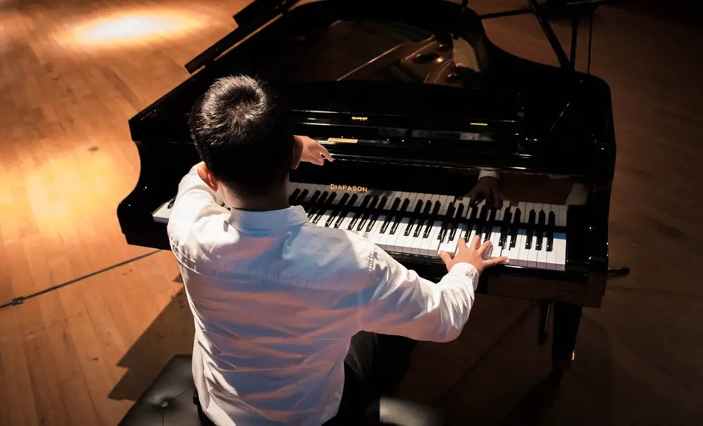 Piano Player Wiping Sweat